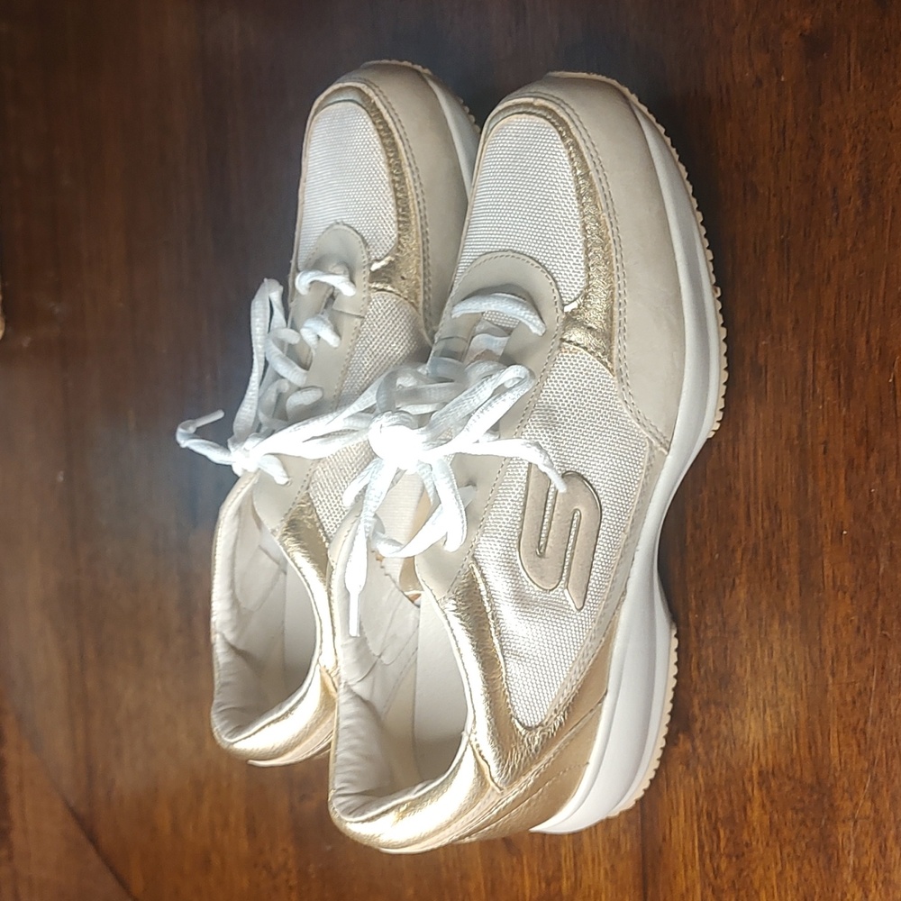 Sketchers - gold wedge sneakers